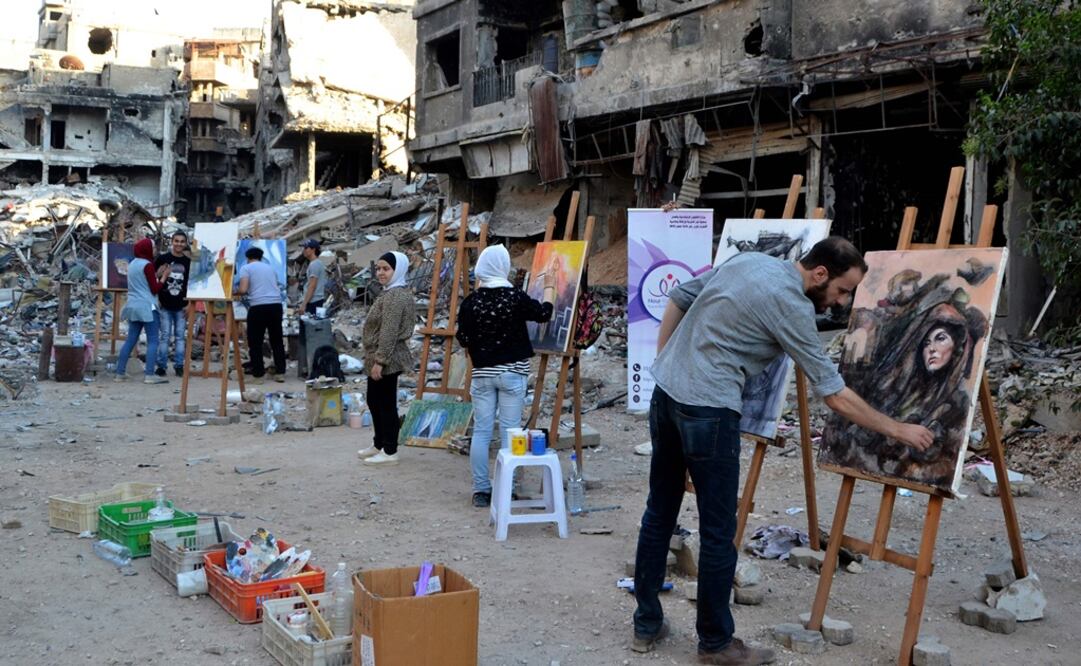 Yarmuk, el campo de refugiados palestinos más grande de Siria, se ha convertido con el tiempo en un barrio de Damasco. Foto: Maher AL MOUNES/AFP