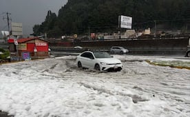 La Marquesa se viste de blanco por fuerte granizada; hielo cubre gran parte de la carretera en ambos sentidos