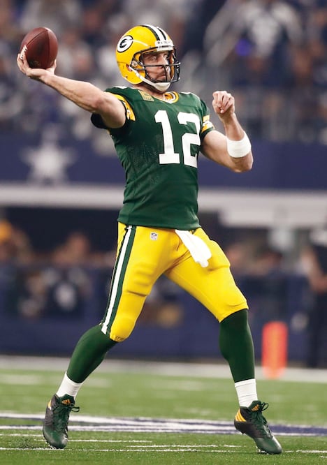 Aaron Rodgers lanzó para 320 yardas y dos anotaciones (LARRY W. SMITH. EFE)