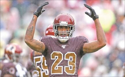 Jugadores de NFL, acusados de pagar sobornos en caso de robo a mano armada