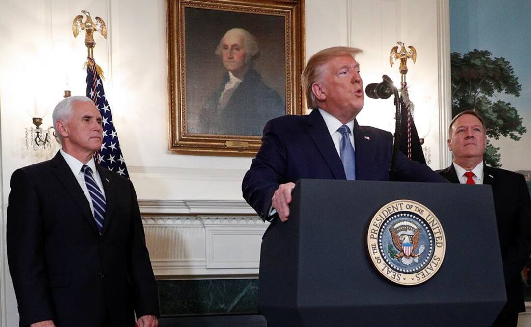 Mike Pence, Donald Trump y Mike Pompeo en un mensaje en la Casa Blanca (Foto: Reuters)