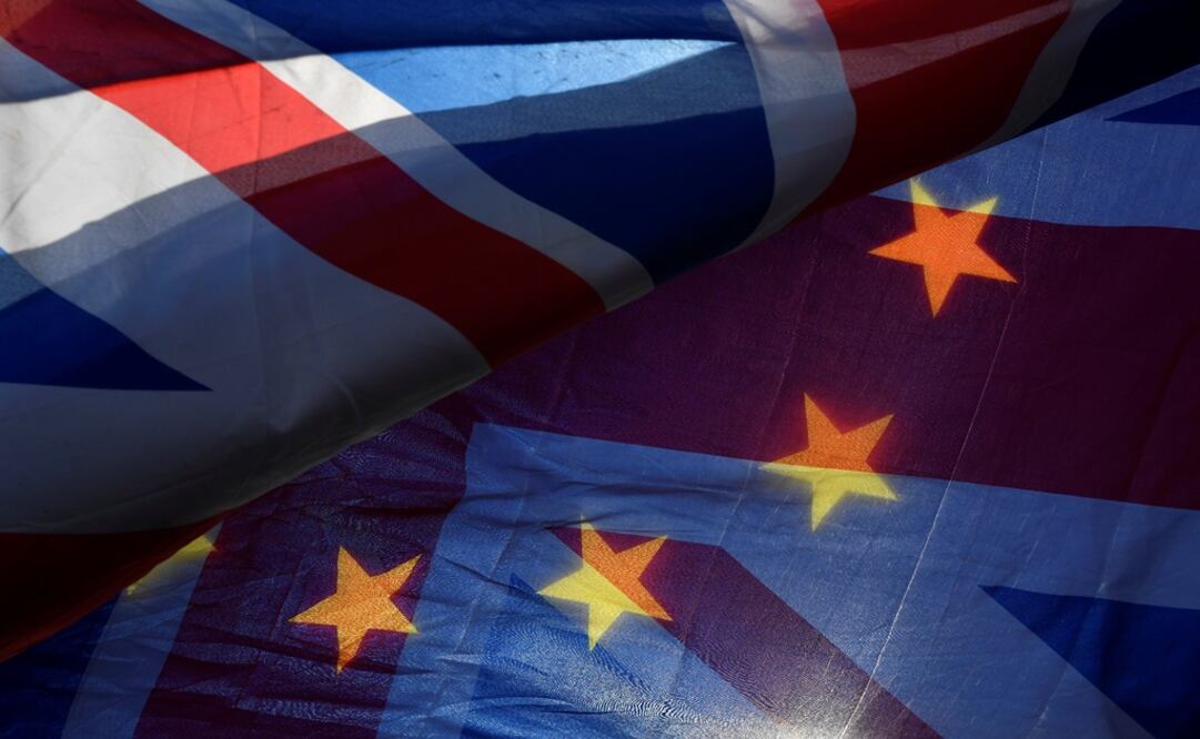 UK and EU flags overlap during an anti-Brexit protest opposite the Houses of Parliament in London, Britain - Photo: Toby Melville/REUTERS