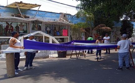 La Santa Cruz que honra a los difuntos del barrio de peregrinos en la colonia Morelos