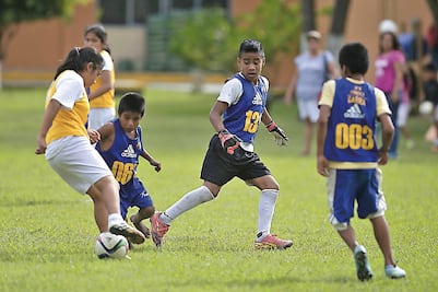 Niños triquis, atigrados