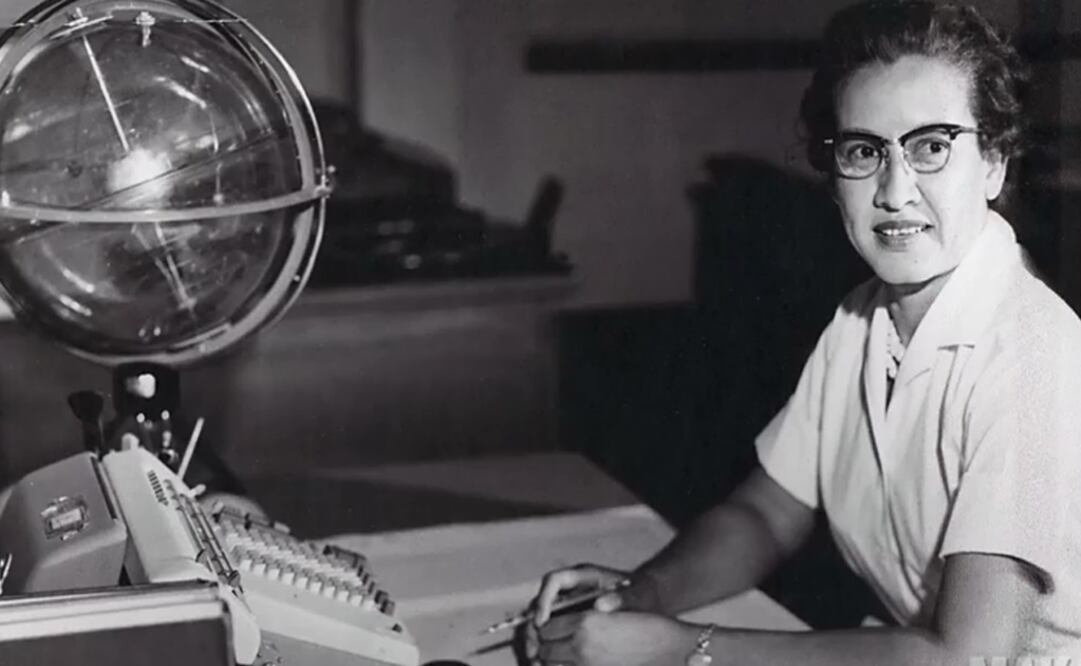 Katherine Johnson sits at her desk with a globe, or "Celestial Training Device" Photo: NASA via REUTERS