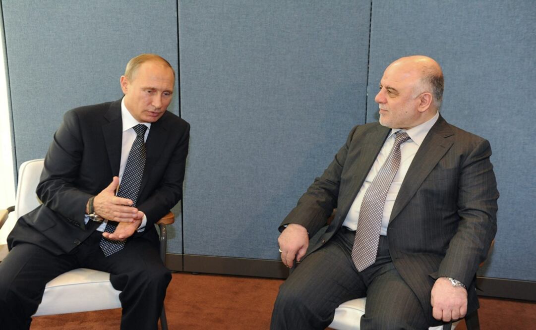 El presidente ruso, Vladimir Putin, conversa con el primer ministro iraquí, Haidar al Abadi (Foto: EFE) 