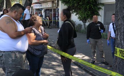 "Era mi bebé", llora madre por su hijo abatido en banco por policía de investigación