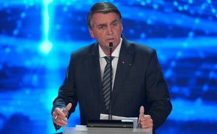 "Eres una vergüenza": Bolsonaro ofende a una periodista durante el debate con Lula