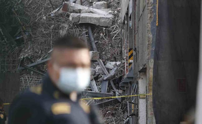 Aumenta a dos la cifra de fallecidos por colapso de edificio en Calzada San Antonio Abad; perro rescatista hizo marcaje