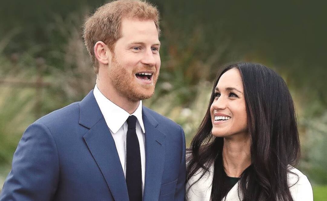 La pareja posó en un jardín del Palacio Kensington (MATT DUNHAM. AP)