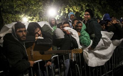 Berlín prevé gastar 93 mmde para ayudar a refugiados 