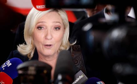 Le Pen llevaría a Francia a la guerra civil si se cumpliera su plan de prohibir el velo islámico, dice Macron