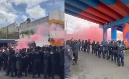 Maestros de la CNTE y normalistas se enfrentan con policías en Michoacán; realizan quema de camiones