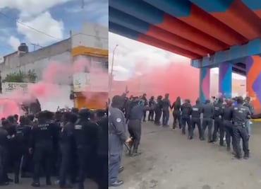 Maestros de la CNTE y normalistas se enfrentan con policías en Michoacán; realizan quema de camiones