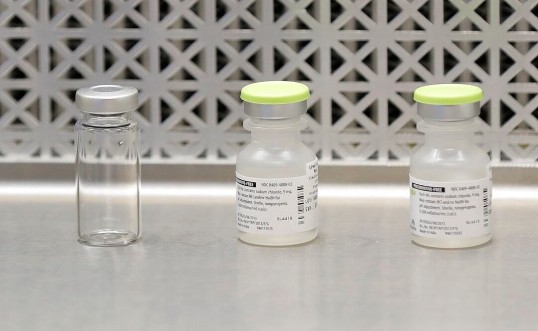 Vials used by pharmacists to prepare syringes used on the first day of a first-stage safety study clinical trial of the potential vaccine for COVID-19 - Photo: Ted S. Warren/AP