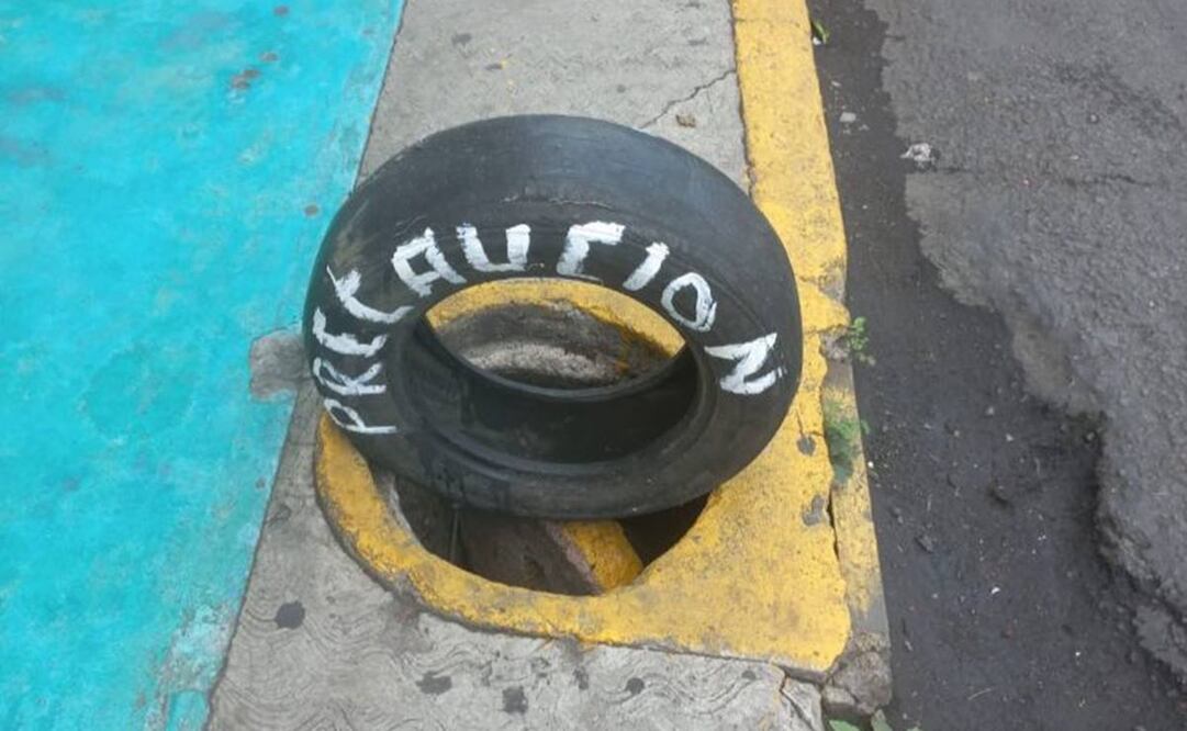 Ausencia de tapa en coladeras. Foto: Especial.