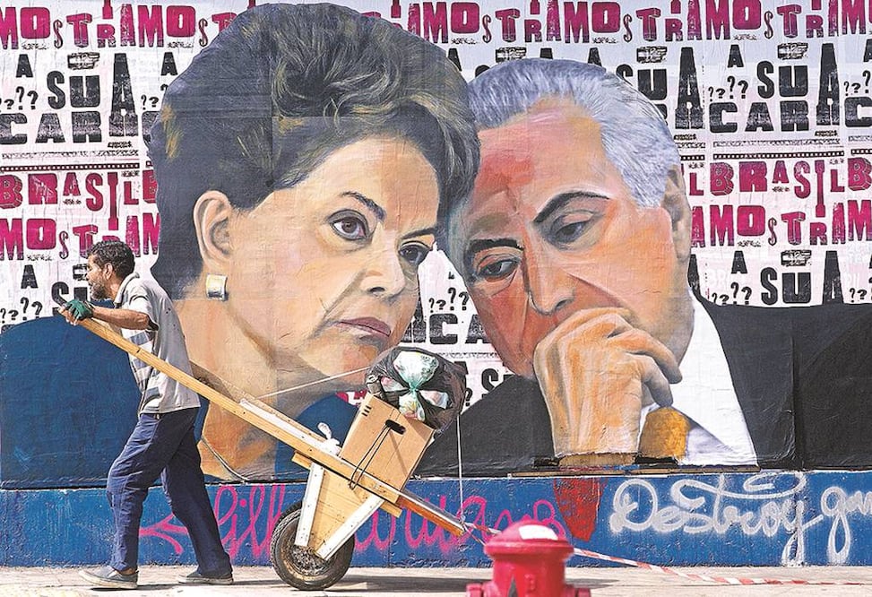Un mural con las caras de Dilma Rousseff y Michel Temer, quien sustituye a ésta en el cargo, en Sao Paulo, Brasil (ARCHIVO. EL UNIVERSAL)