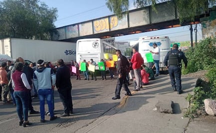 Exigen justicia para chofer que murió aplastado por un árbol; bloquean autopista México-Pachuca