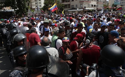 Chavistas y oposición vuelven a las calles de Venezuela tras apagón masivo