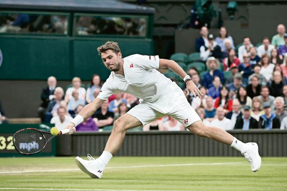 El suizo era el cuarto sembrado en el torneo londinense, donde Del Potro no jugaba desde 2013, por lesión (PAUL CHILDS. REUTERS)