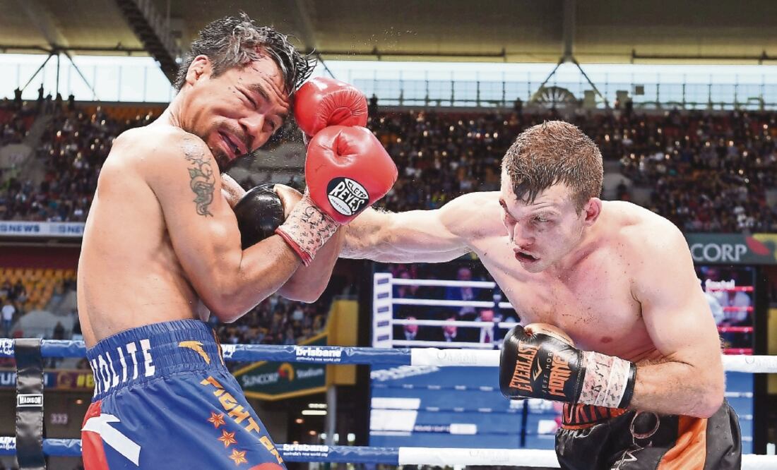 La decisión de los jueces en la pelea Pacquiao-Horn causó controversia y Manny pide investigar calificaciones (REUTERS)