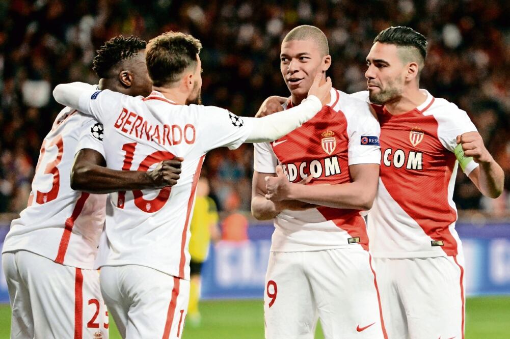 Falcao (der.) y compañía fueron efectivos en los 180 minutos (XINHUA)