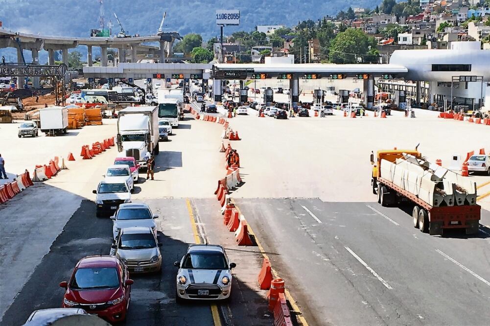 En la carretera México-Cuernavaca el ingreso de automovilistas es lento debido a que hay trabajos por la Autopista Urbana Sur. En la caseta se registró el acceso de 20 vehículos y la salida de 35 (ARIEL OJEDA. EL UNIVERSAL)