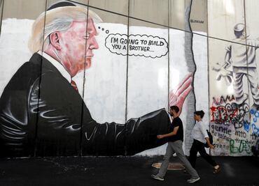 Con graffiti, critican en Belén gusto de Trump por los muros