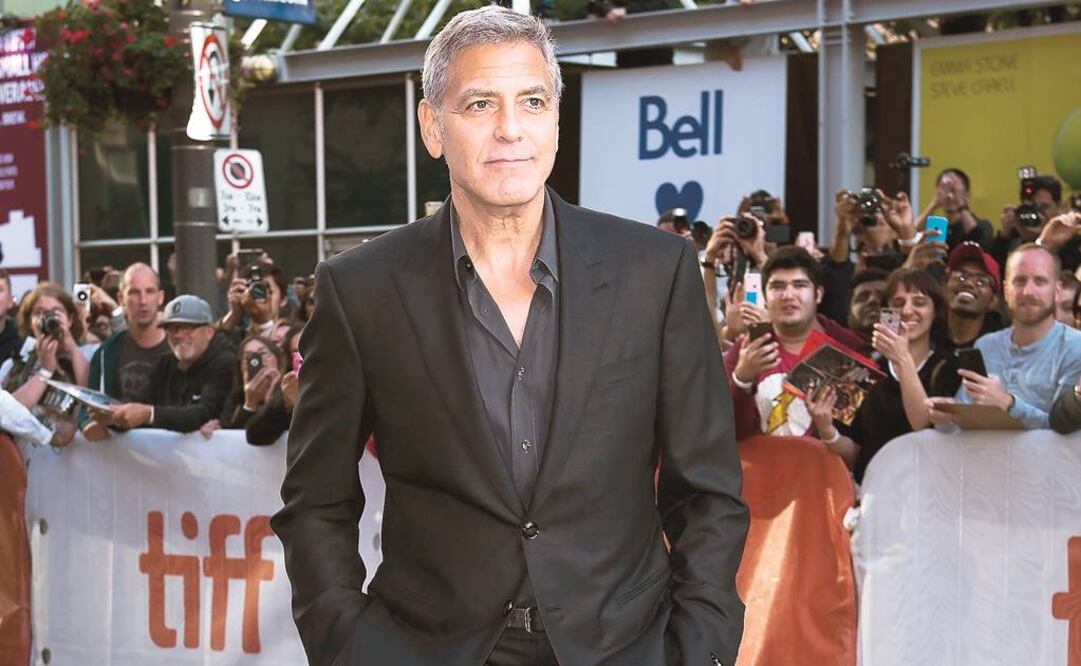 George Clooney acaparó los flashes desde su llegada a Toronto. (AP)
