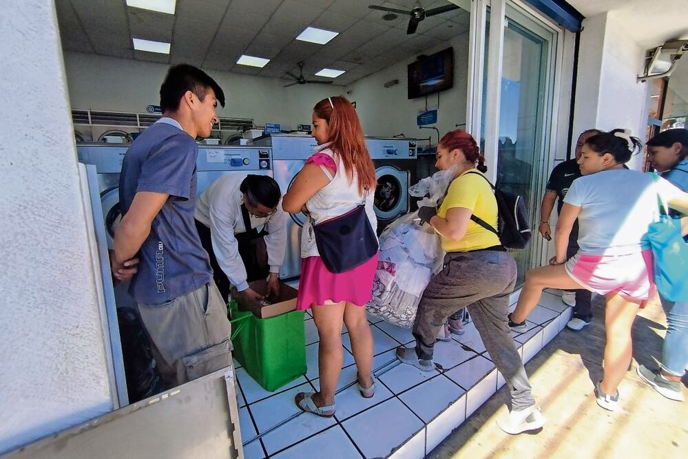 Van a lavanderías por el insuficiente suministro en casa