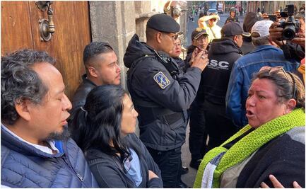 VIDEO: Conato de riña entre caravana de Acapulco y personal de atención ciudadana de Palacio Nacional