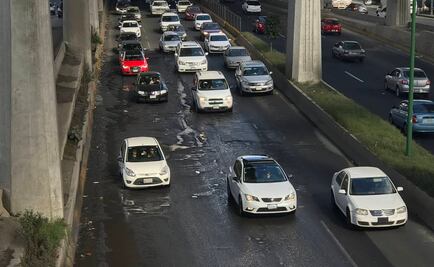 Reparan fuga, pero siguen baches en Periférico Norte