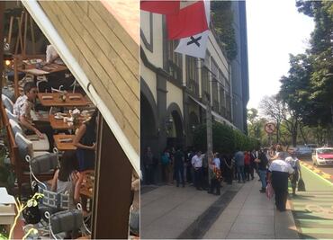 Noel Gallagher desayuna mientras sus fans esperan