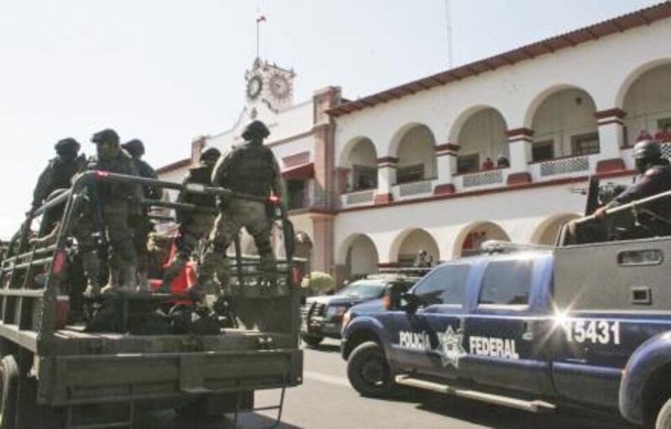 Lucha de cárteles prende Michoacán