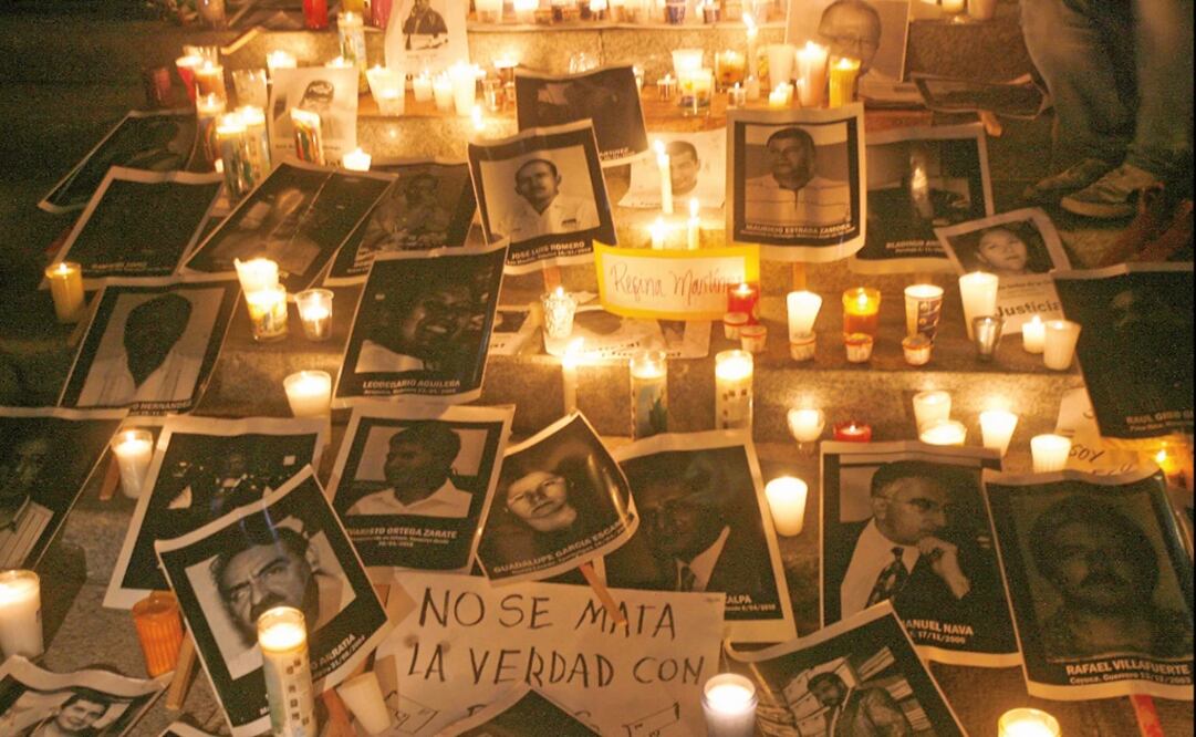 Photographs of murdered journalists, surrounded by candles in a memorial in Mexico City. - Photo: EFE /Shenka Gutiérrez
