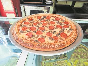 Musulmán demanda a pizzería por venderle carne de cerdo