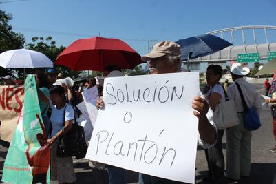 Tras bloqueo, se compromete SCT a reparar fallas del Paso Exprés