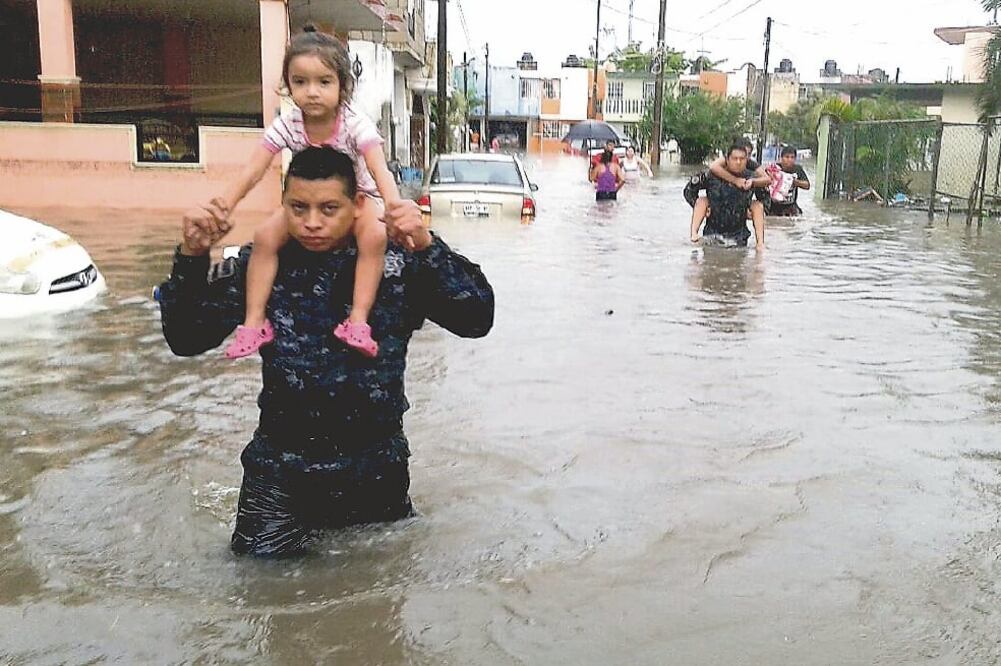 Viviendas y autos inundados fueron parte de los estragos que dejaron las fuertes lluvias registradas en el sur de Tamaulipas y que afectaron al menos tres municipios (CORTESÍA INFONORTE)