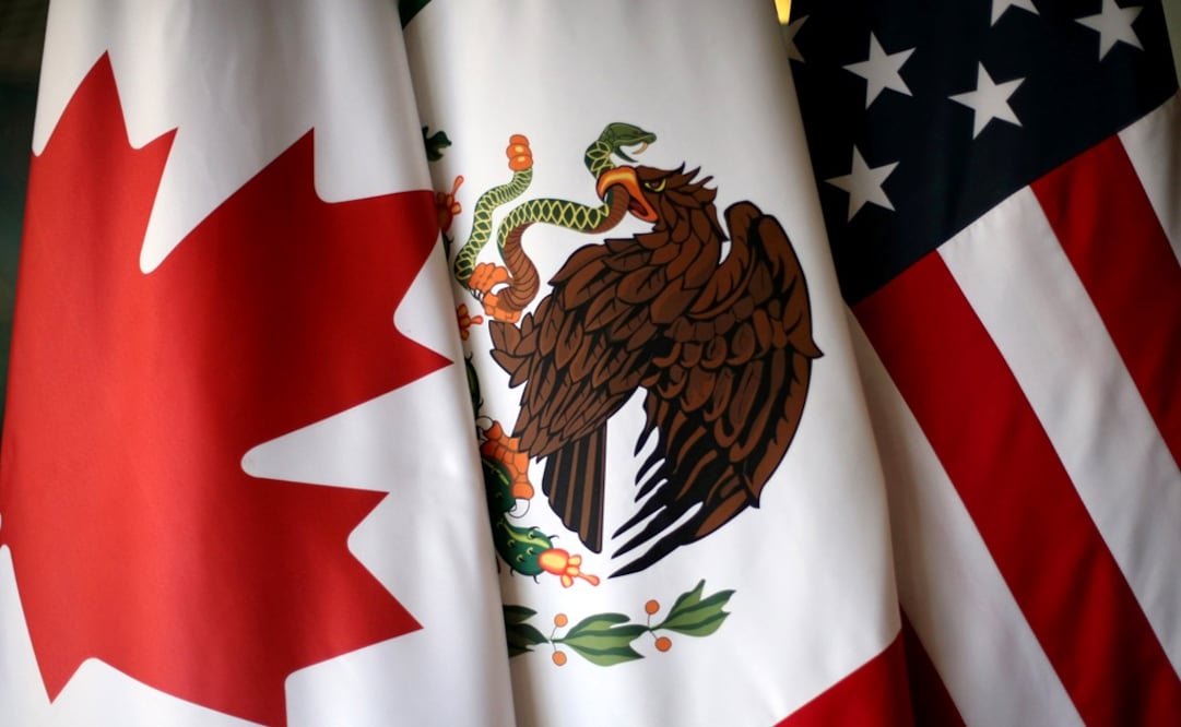 Flags are pictured during NAFTA talks involving the United States, Mexico and Canada – Photo: Edgard Garrido	/REUTERS