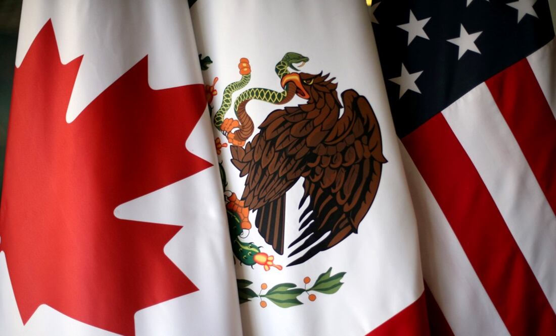 Flags are pictured during NAFTA talks involving the United States, Mexico and Canada – Photo: Edgard Garrido /REUTERS