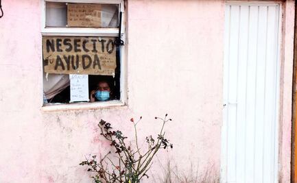 SOS: Familia entera contagiada de Covid pide ayuda con letrero en su ventana