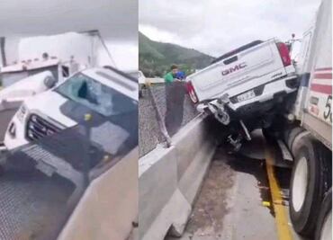 Conductor de tráiler choca contra presuntos ladrones e impactan en muro de contención en carretera Arco Norte