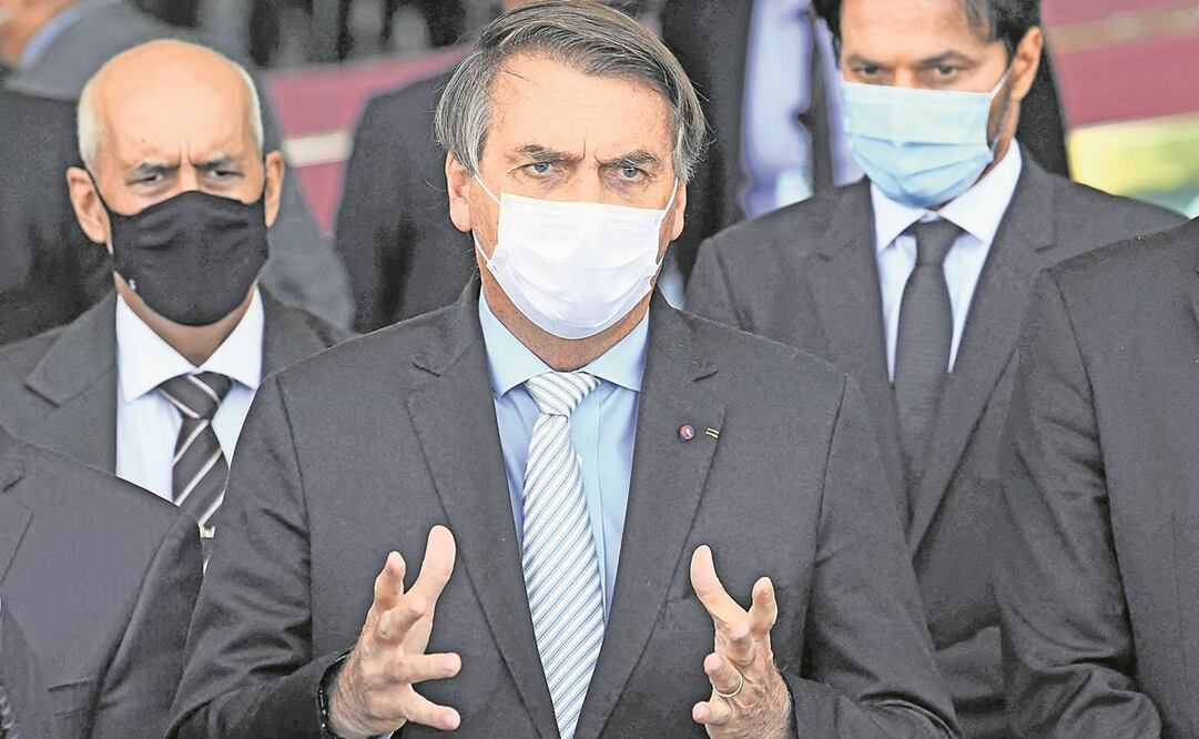 El presidente brasileño, Jair Bolsonaro, el pasado 24 de marzo. Descartó el aislamiento y convocó a aglomeraciones en el país. Foto: Evaristo SA/ AFP.