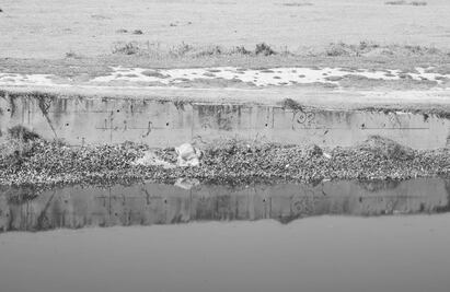 Hallan el cuerpo de un hombre en cauce del Río Lerma en Edomex