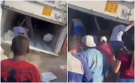 VIDEO: Cae caja de tráiler mientras era saqueado tras volcadura en SLP; acto de rapiña deja lesionados
