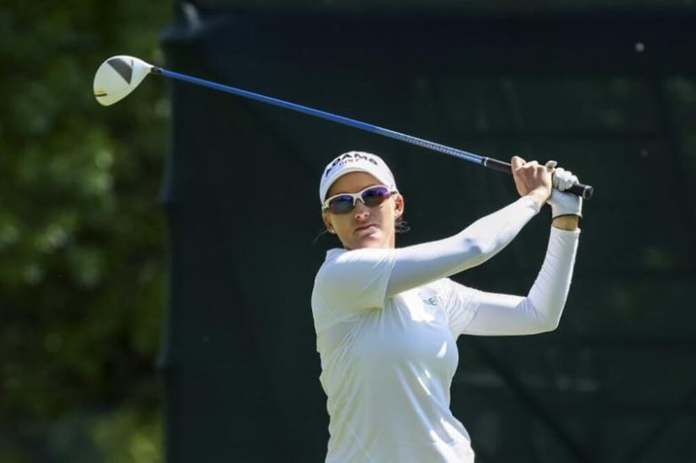 Sarah Jane Smith of Australia tees off on the eighth hole during round three of the LPGA Golf Championship in Pittsford, New York June 9, 2013. REUTERS/Adam Fenster