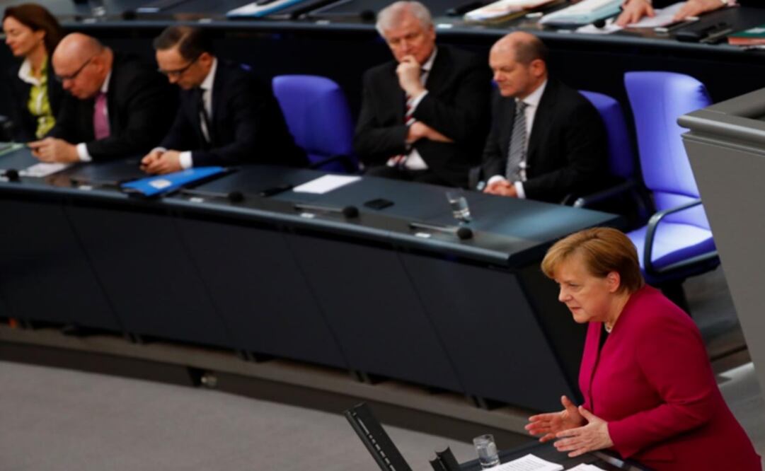 German Chancellor Angela Merkel addresses the lower house of parliament Bundestag in Berlin, Germany – Photo: Fabrizio Bensch/REUTERS