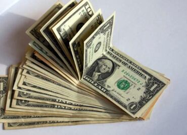 Dólar baja 35 centavos; cotiza en $21.90