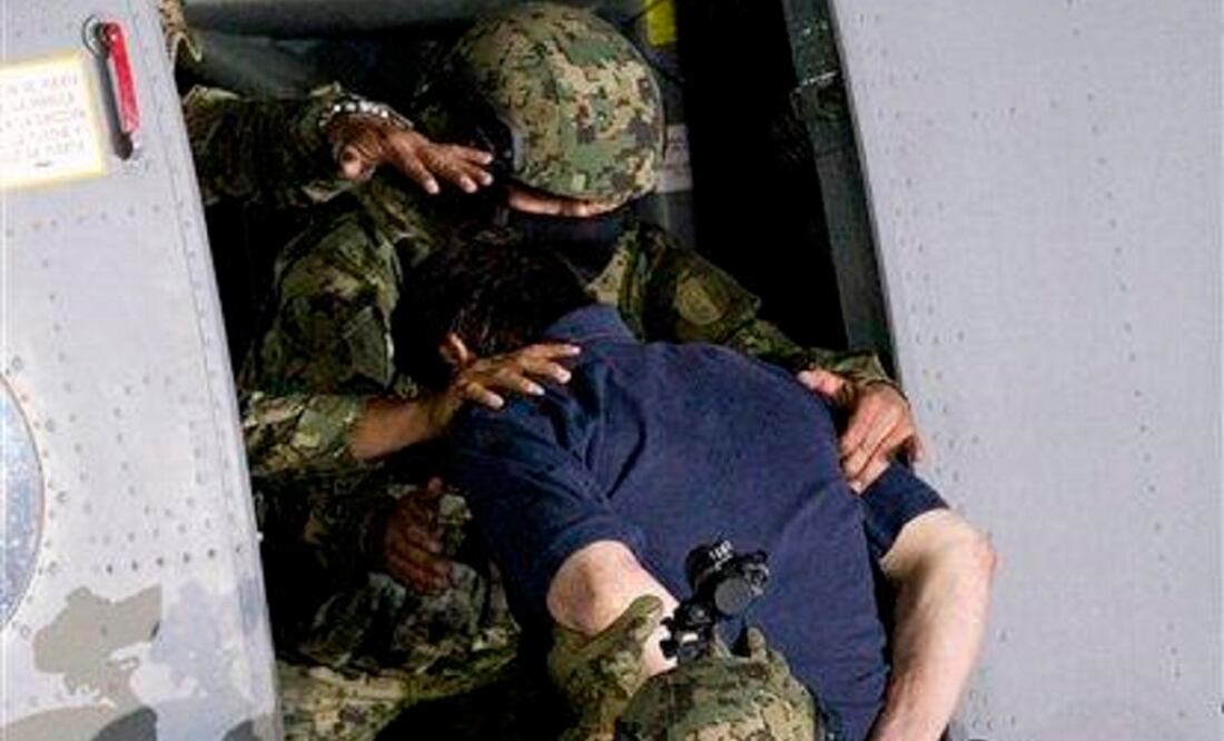 Mexican drug lord Joaquín "El Chapo" Guzmán was recaptured by Mexican marines Friday, six months after he fled through a tunnel from a maximum secuirty prison. (Photo: AP)