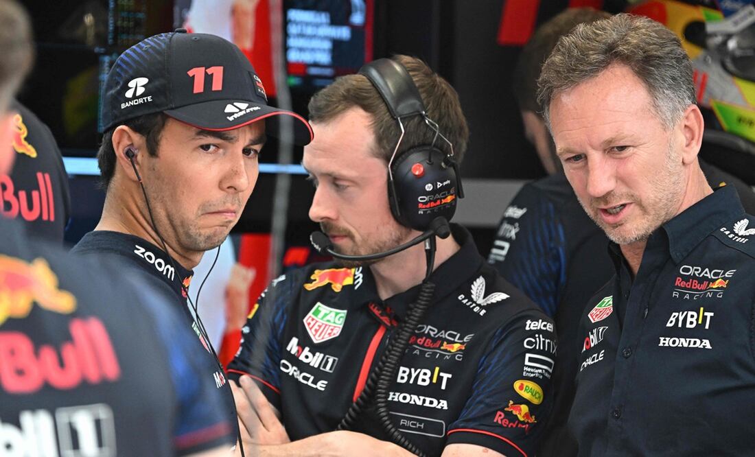 Checo Pérez y Christian Horner durante las actividades del Gran Premio de Hungría - Foto: AFP